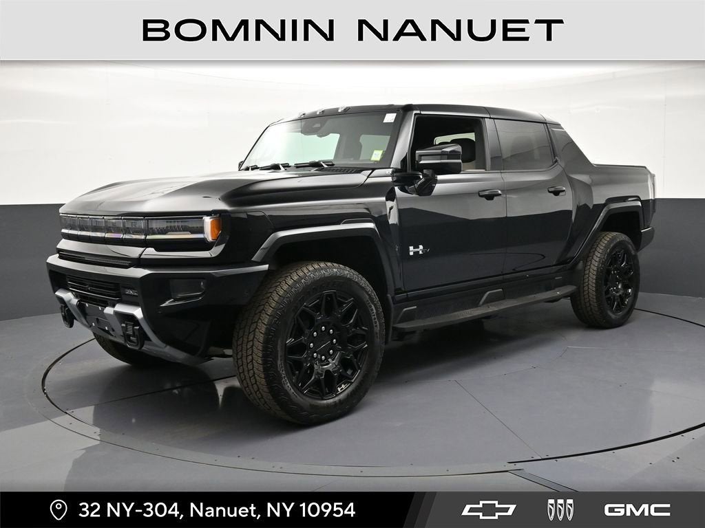 2026 GMC HUMMER EV Pickup 2X in Void Black — front three-quarter view