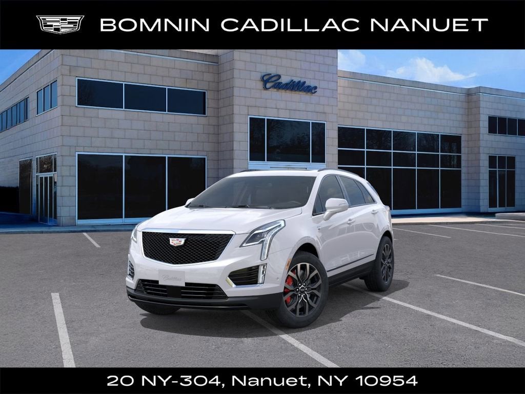 2026 Cadillac XT5 Sport in Crystal White Tricoat — front three-quarter view