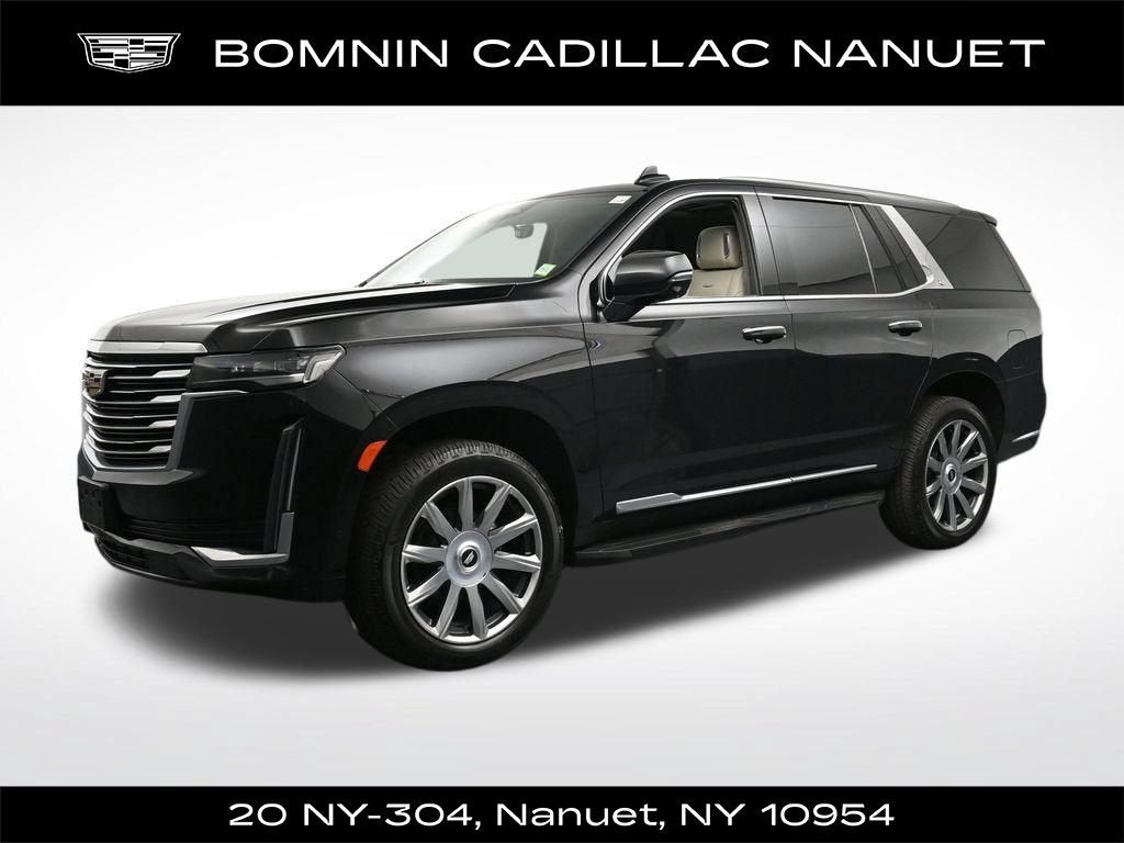 2021 Cadillac Escalade Premium Luxury Platinum in Black Raven — front three-quarter view