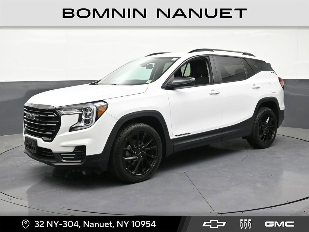 2023 GMC Terrain SLE in Summit White — front three-quarter view