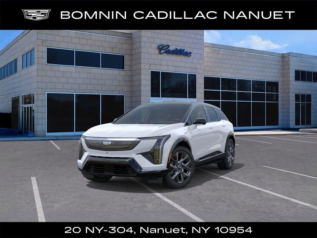 2026 Cadillac OPTIQ Luxury in Vibrant White Tricoat — front three-quarter view