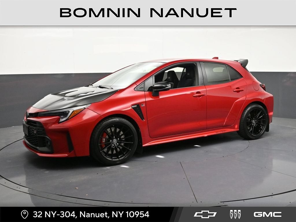 2023 Toyota GR Corolla Core in Supersonic Red — front three-quarter view